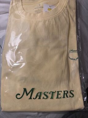 NEW in bag purchased today Masters 2026 Pale Yellow T-Shirt with Green Logo.